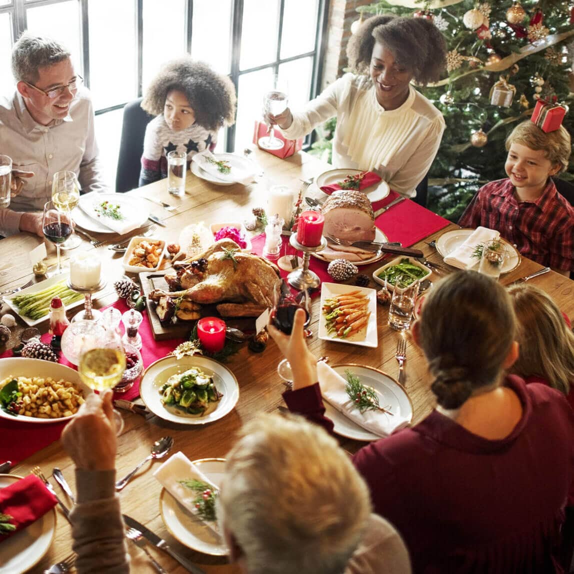 A family shares a meal during Christmas