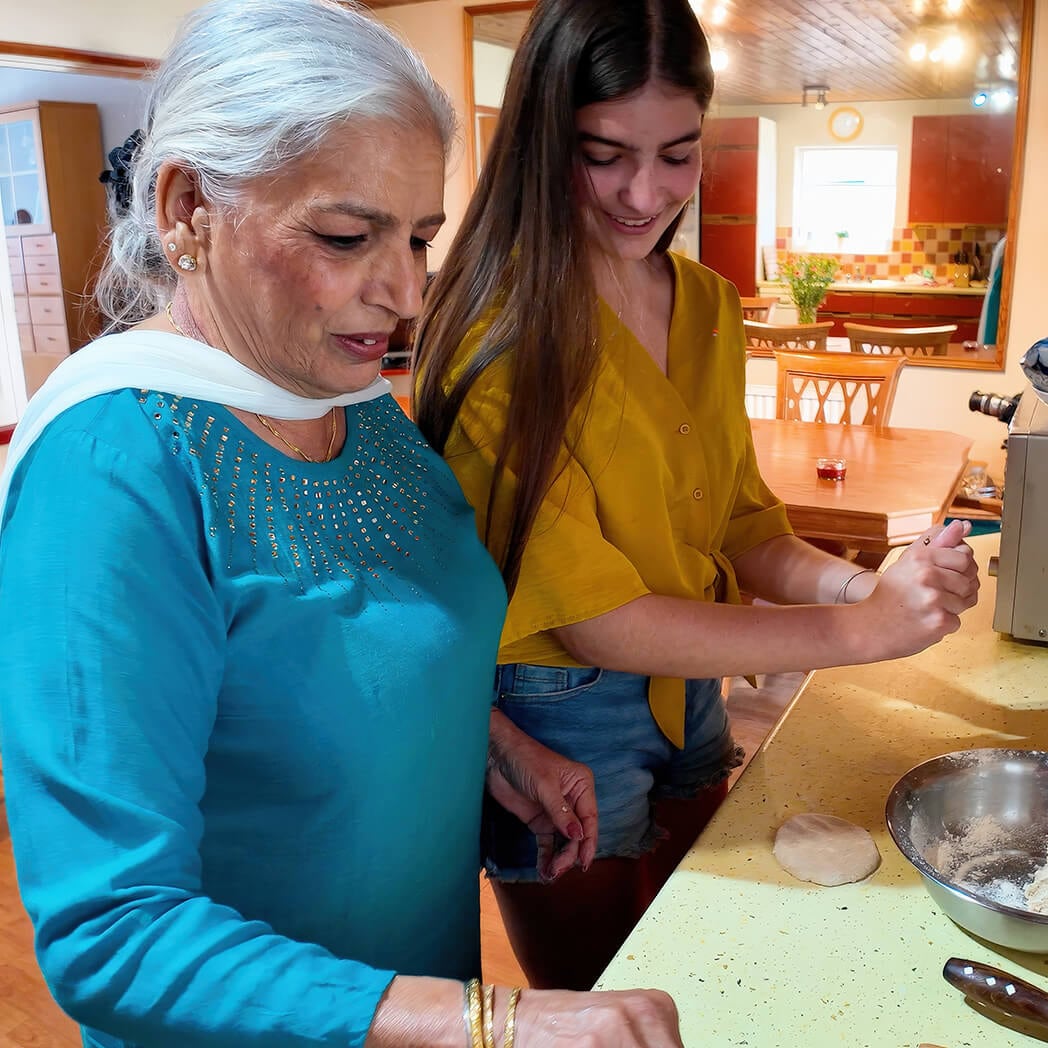 Daljit Chana cooks with her granddaughter Maya